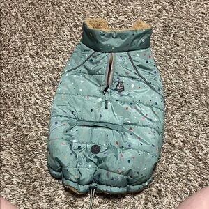 Reversible Sherpa Dog Jacket Green Patterned Jacket. Built In Poop Bag Pocket.